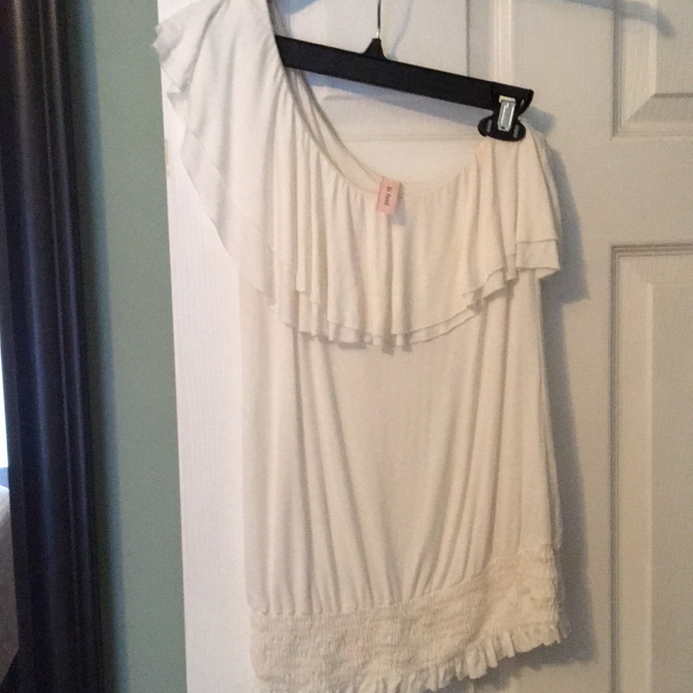 One shoulder ruffle top.